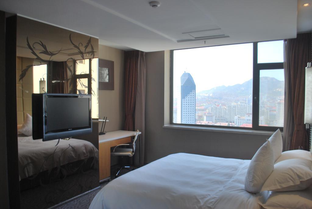 The Center Hotel Вэйхай Номер фото