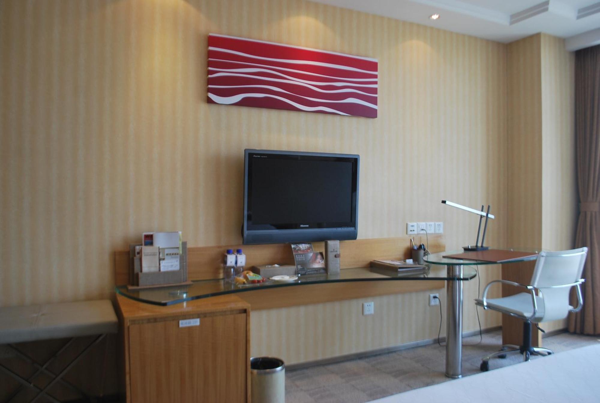 The Center Hotel Вэйхай Экстерьер фото