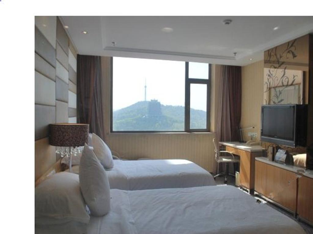 The Center Hotel Вэйхай Экстерьер фото