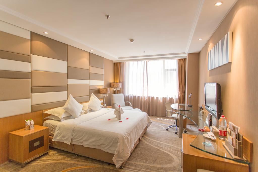 The Center Hotel Вэйхай Экстерьер фото